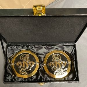 Unused RKO side plates for replica WWE Title belt. Commemorative box included.